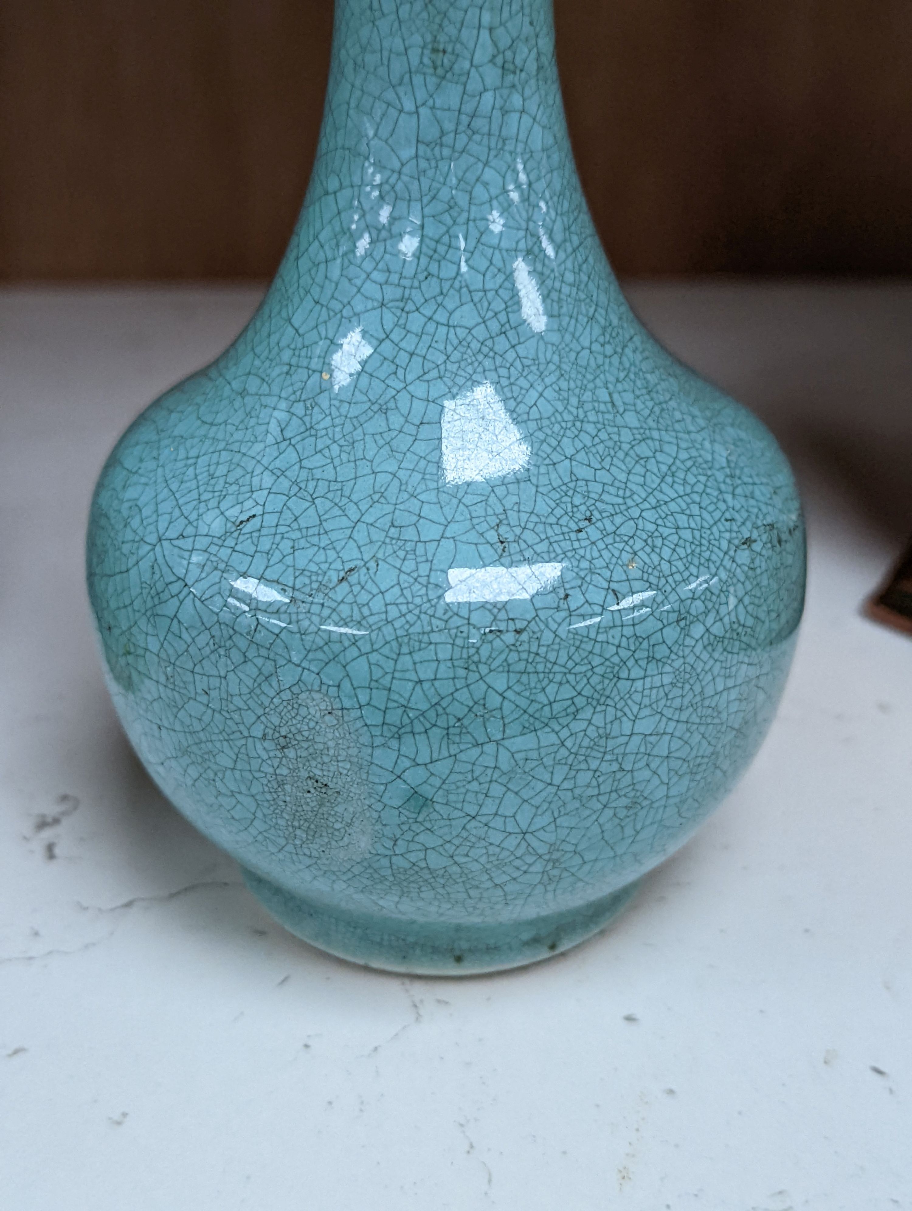 Three 19th Chinese monochrome glazed vases, with sang de boeuf, celadon and turquoise crackle glaze, tallest 21 cm